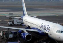 Passengers stranded at airport terminal waiting for updates following the cancellation of Air India and IndiGo flights to Riyadh due to Houthi attacks in Saudi Arabia