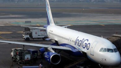 Passengers stranded at airport terminal waiting for updates following the cancellation of Air India and IndiGo flights to Riyadh due to Houthi attacks in Saudi Arabia