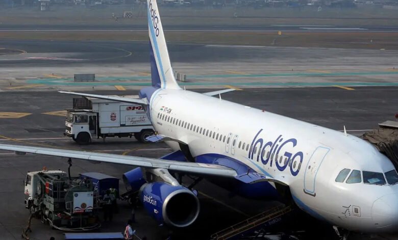 Passengers stranded at airport terminal waiting for updates following the cancellation of Air India and IndiGo flights to Riyadh due to Houthi attacks in Saudi Arabia